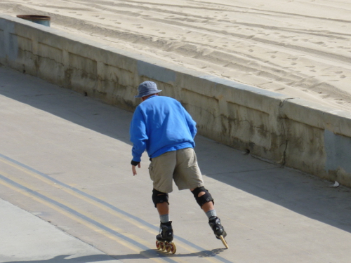 All day, every day, this man roller-bladed.