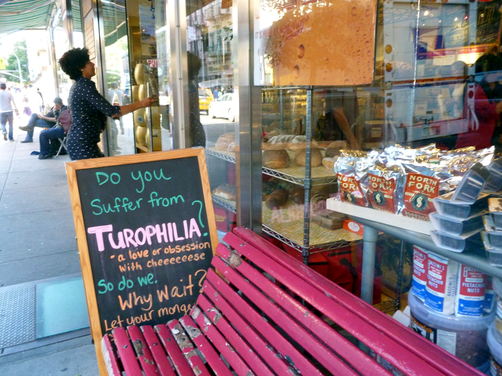 Turophilia (excessive love of cheese) Greenwich Village, sign outside the cheese shop